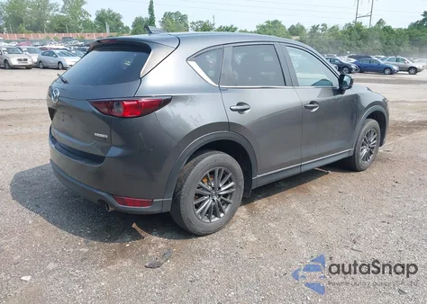 2021 Mazda Cx-5 Touring z USA, uszkodzony, nr VIN JM3KFACMXM1333664